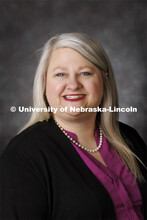 Studio portrait of Maria Walker, 4-H Youth Development Extension Educator. Portraits of Extension, I