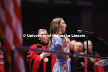 The national anthem is sung during Graduate commencement in Pinnacle Bank Arena. May 13, 2022. 