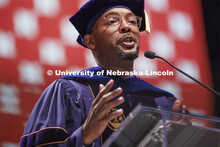 Marco Barker, Vice Chancellor for Diversity and Inclusion, delivers the commencement address. Gradua