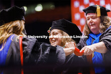 Jamie Koch smiles after receiving her doctor of audiology degree. Graduate commencement in Pinnacle 