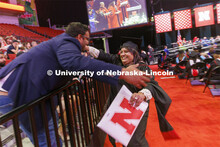Aakriti Agrawal hugs her brother, Akshay, after she received here MBA. Graduate commencement in Pinn