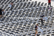 Chairs for Saturday’s undergraduate commencement in Memorial Stadium have been set up and seat num