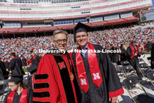 UNL Chancellor Ronnie Green chats with Grady Johnson. Johnson finished his degree online and tweeted