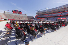 Students are seated at the UNL undergraduate commencement in Memorial Stadium. May 14, 2022. 