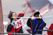 Sifat Syed shows off her college of Engineering diploma to friends and family. UNL undergraduate com