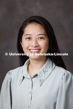 Studio portrait of Tran Doan, Math Science counselor with TRIO. May 19, 2022. 