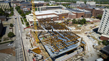 Three of the six floors of Kiewitt Hall, the new College of Engineering building, rise above campus.