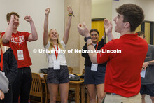 Jack Kinney’s group cheer after solving an ice breaker. New Student Enrollment. June 1, 2022. 