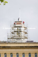 Scaffolding begins to surround the Love Library cupola as part of the renovation process. June 6, 20