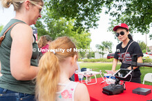 Discovery Day attendees learn about drones. The East Campus Discovery Days and Farmer’s Market at 