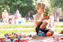 Discovery Day attendees listen to music while playing with toys. The East Campus Discovery Days and 