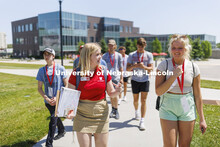 New Student Orientation Leader Malia Bloemker talks with Savanna Musich as they discuss residence ha