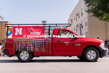 University of Nebraska representatives circle around the Capitol during the Star City Pride parade. 