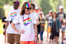 University of Nebraska representatives interact with members of the crowd during the Star City Pride