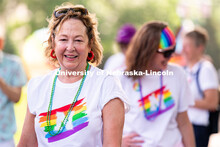 University of Nebraska representatives walk around the Capitol during the Star City Pride parade. Ju
