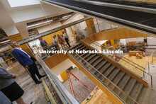 A new central staircase opens the floors to light. Chancellor Ronnie Green and donors take a tour of