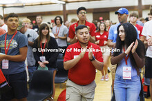 New Student Enrollment leader Osvaldo Palma Vargas runs into the Union ballroom to start the day. Ju