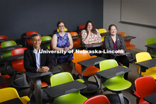 Leen-Kiat Soh (from left), Wendy Smith, Mindi Searls and Brittany Duncan sit in Avery Hall. The Husk