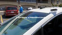 Bill Manning, Operations Manager and Assistant Director for Parking and Transit Services, demonstrat