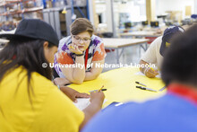 Academy mentor Shiloh King talks about the designs with the students. 2022 MATC/NCIA Sovereign Nativ