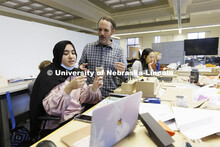 Lloyd “Bud” Shenefelt, Assistant Professor of Architecture, critiques a design by second year st