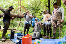 Research Engineer Alan Boldt (center-right) assembles tools to measure the water flow rates of Salt 