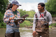 Jamie Duan(left) and Amit Kumar Rai (right) laugh during their Irrigation Laboratory and Field Cours
