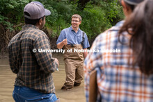 Professor Derek Heeren speaks with students during his Irrigation Laboratory and Field Course class 