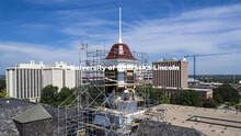 Scaffolding surrounds the Love Library Cupola during the restoration. July 15, 2022. 