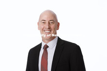 Studio portrait of Dave Remund, Assistant Professor of Practice in Public Relations. August 3, 2022.