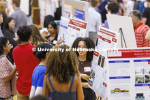 Lincoln High School student Lali Regassa describes her summer research working with gold nanoparticl