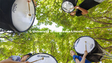The Cornhusker Marching Band percussion groups kick off the school year. Bass drummers, clockwise fr