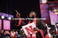 Papay Glaywulu waves to family and friends after receiving his degree. Nebraska grants about 600 deg