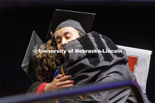 Mattheows Mamo Ginting receives a hug from his mother, professor Martha Mamo, as Mattheows received 