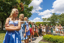 Students line up outside Delta Delta Delta sorority during their house visit. Sorority recruitment P