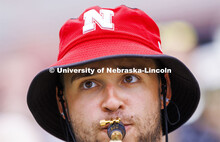 Cornhusker Marching Band practice in Memorial Stadium under the lights. August 18, 2022. 
