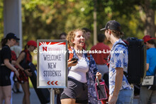 Lara Celesky talks with Brock Godown as the Cornhusker Marching Band Members grab a bite to eat the 