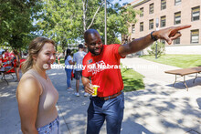 Nicolas Gordan, a College of Arts and Sciences recruiter helps a student at the CAS College Welcome 