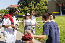 A friend reunion outside the Hixon-Lied College of Fine and Performing Arts College Welcome for new 