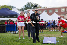 UNL Police Department officers play cornhole at the Chancellor’s BBQ to welcome the class of 2026 