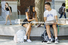 Dinushi Jayasekara, left, a freshman from Omaha, and Eldin Salja, a freshman from Lincoln, talk outs