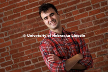 Studio portrait of Matthew Strasburger, Associate Copy Writer, Office of University Communication. A