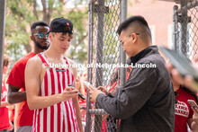 Husker fans are lined up and scanning their tickets to get in to the Nebraska vs Northwestern footba