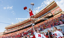 Nebraska’s cheerleaders and spirit squads cheer for the players. Nebraska vs. Georgia Southern foo