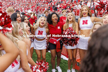 Husker Cheer Coach Erynn Butzke helps fire up the Scarlets Dance Team before the start of the Nebras