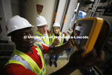 Bruce Dvorak, center, Professor of Civil and Environmental Engineering, coaches Yves Cedric Tamwo No