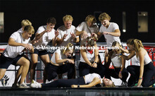 Members of Triad 6 (Alpha Tau Omega and Chi Omega) bring a performer to life on stage at Showtime at