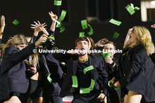 Money rains down on members of Triad 11 (Alpha Xi Delta, Delta Sigma Phi, FarmHouse and Triangle) du