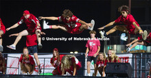 Members of Triad 9 (Alpha Gamma Rho, Pi Beta Phi and Theta Xi) get some air at Showtime at the Vine 