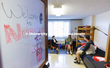 Students socializing in their dorm rooms. Housing Photo Shoot in Able Sandoz Residence Hall. Septemb